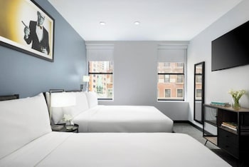 Deluxe Room, 2 Queen Beds | Egyptian cotton sheets, premium bedding, in-room safe, desk at OYO Times Square