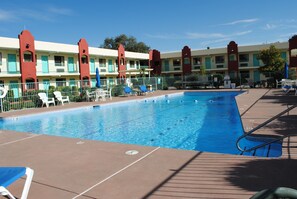 Seasonal outdoor pool, open 8:00 AM to 9:00 PM, sun loungers