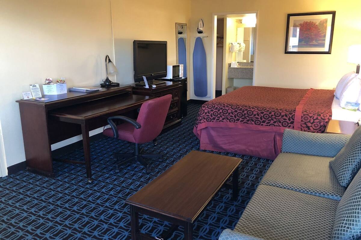 Desk, laptop workspace, blackout drapes, soundproofing