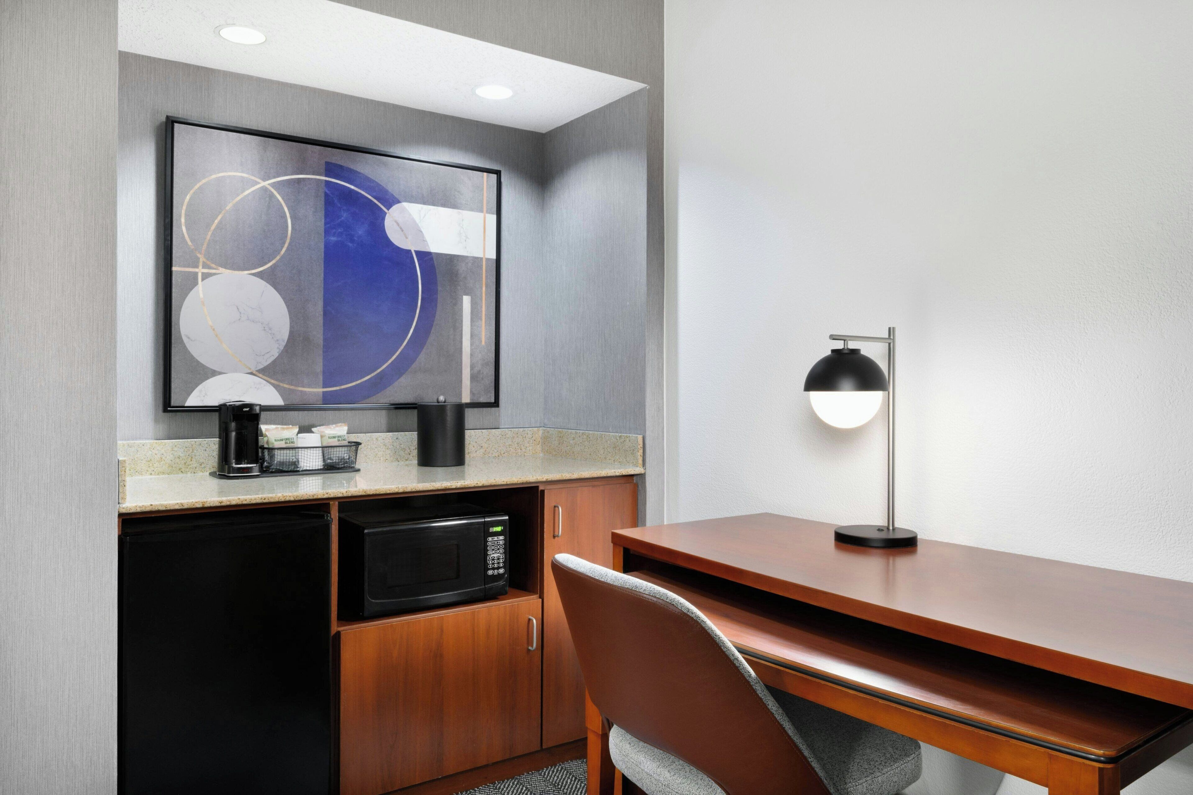 premium bedding, desk, laptop workspace, iron/ironing board