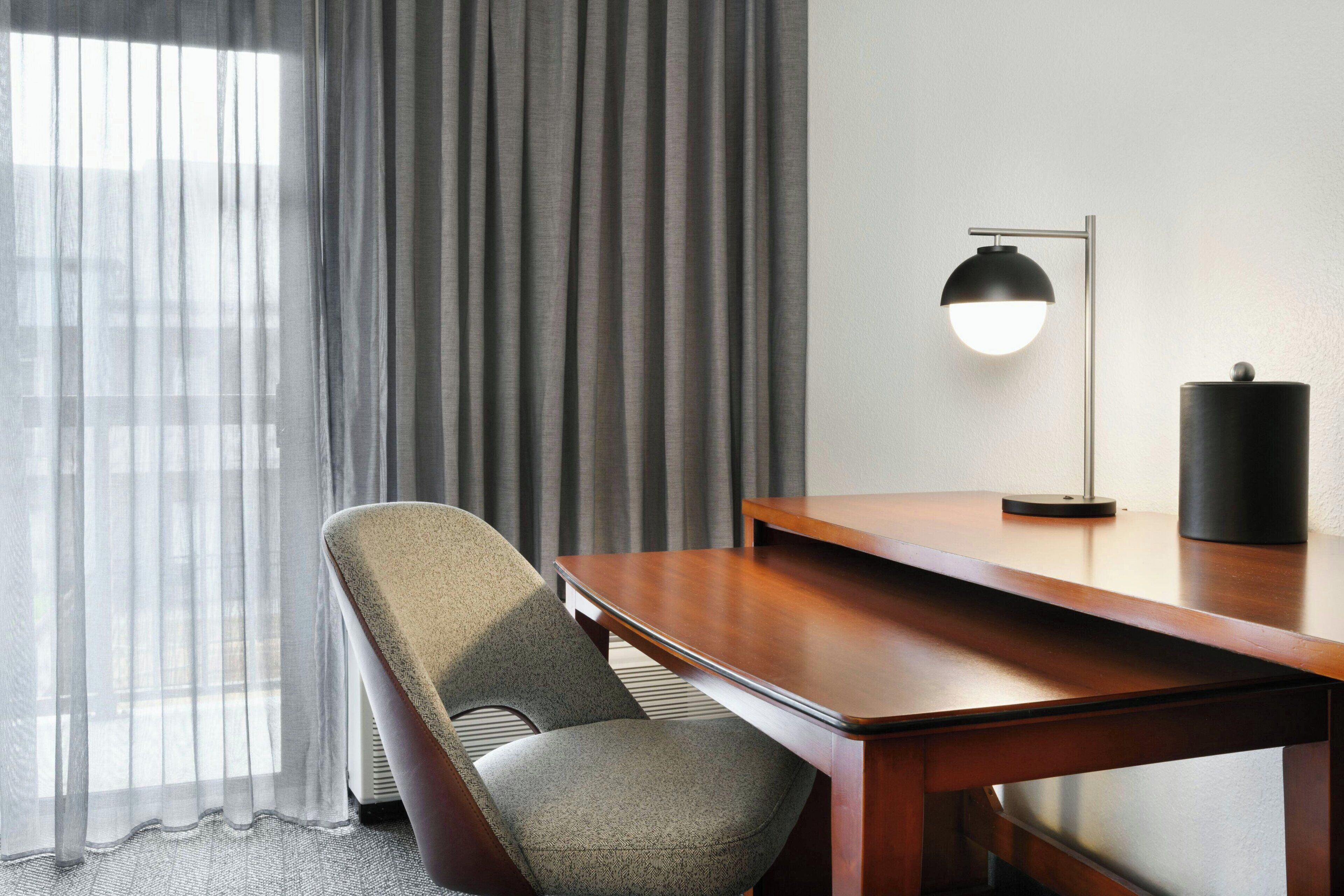 premium bedding, desk, laptop workspace, iron/ironing board