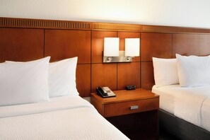 Premium bedding, desk, laptop workspace, iron/ironing board