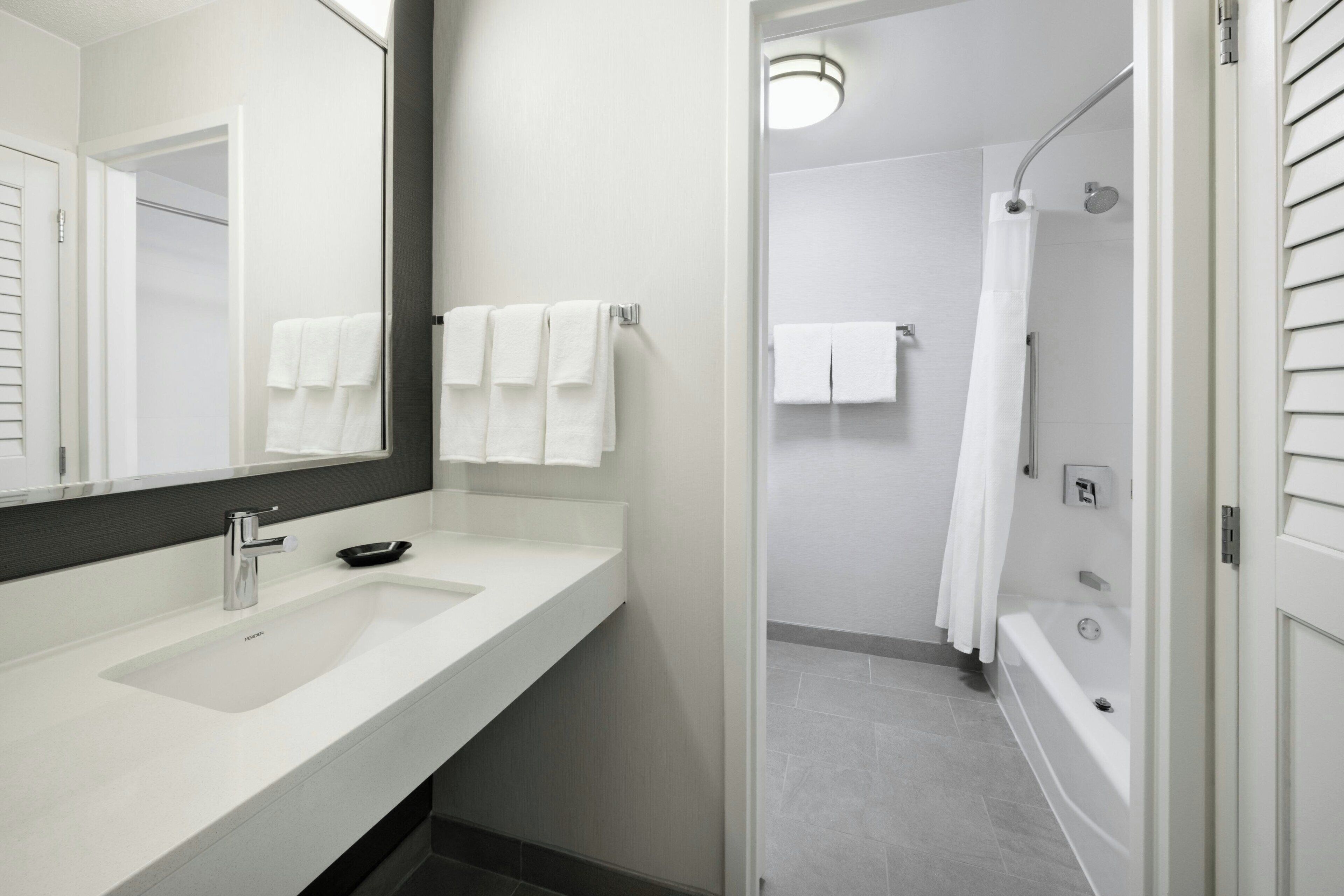 combined shower/bathtub, free toiletries, hair dryer, towels