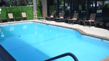 Seasonal outdoor pool, open 10 AM to 10 PM, pool loungers