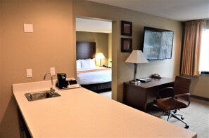 1 King Bed, Suite, Nonsmoking, Upgrade | Living area | 55-inch LED TV with cable channels, TV