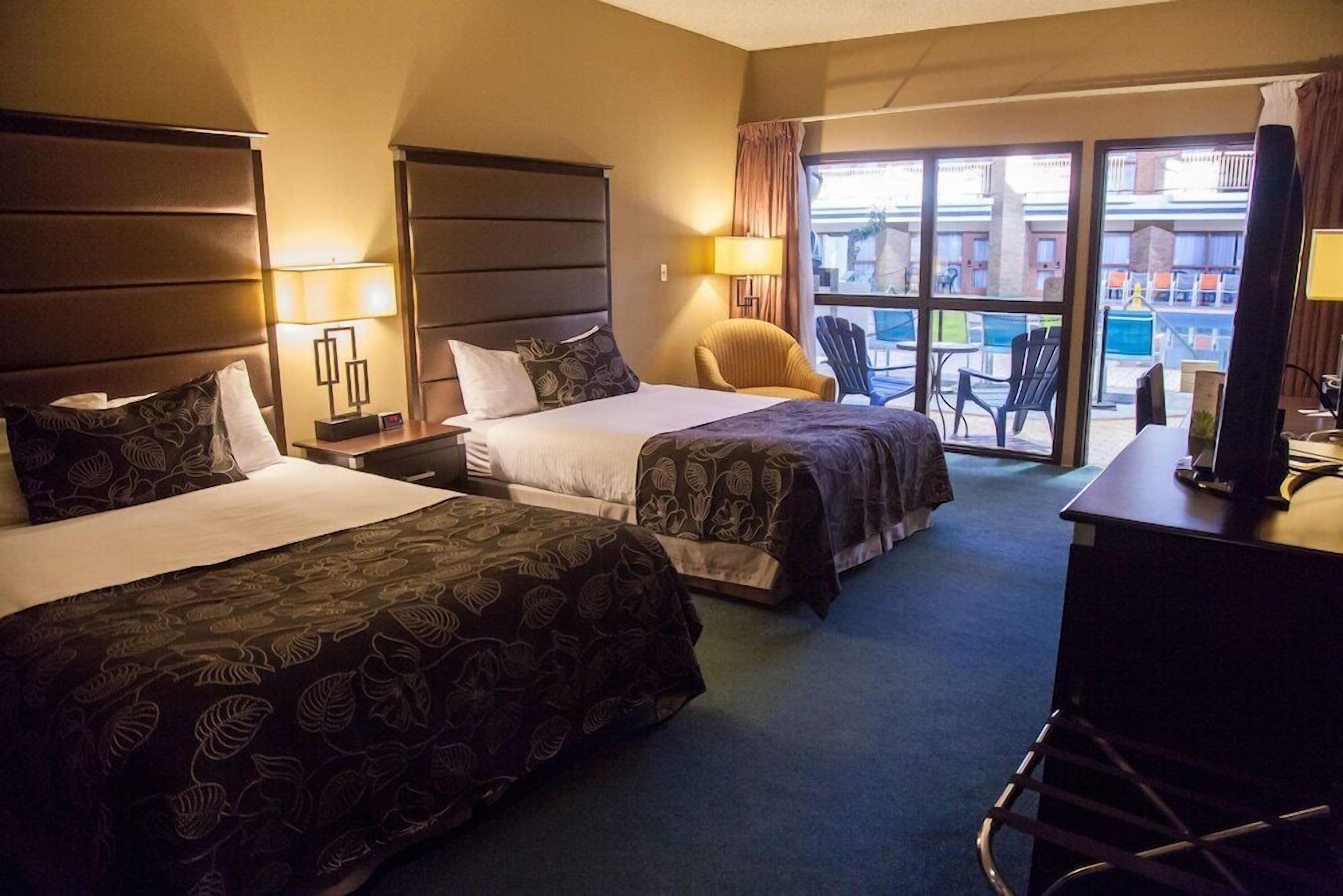 Luxe beddengoed, pillowtop-bedden, een kluis op de kamer