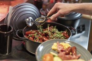 Guests can cook and prepare meals in this well-equipped kitchen.