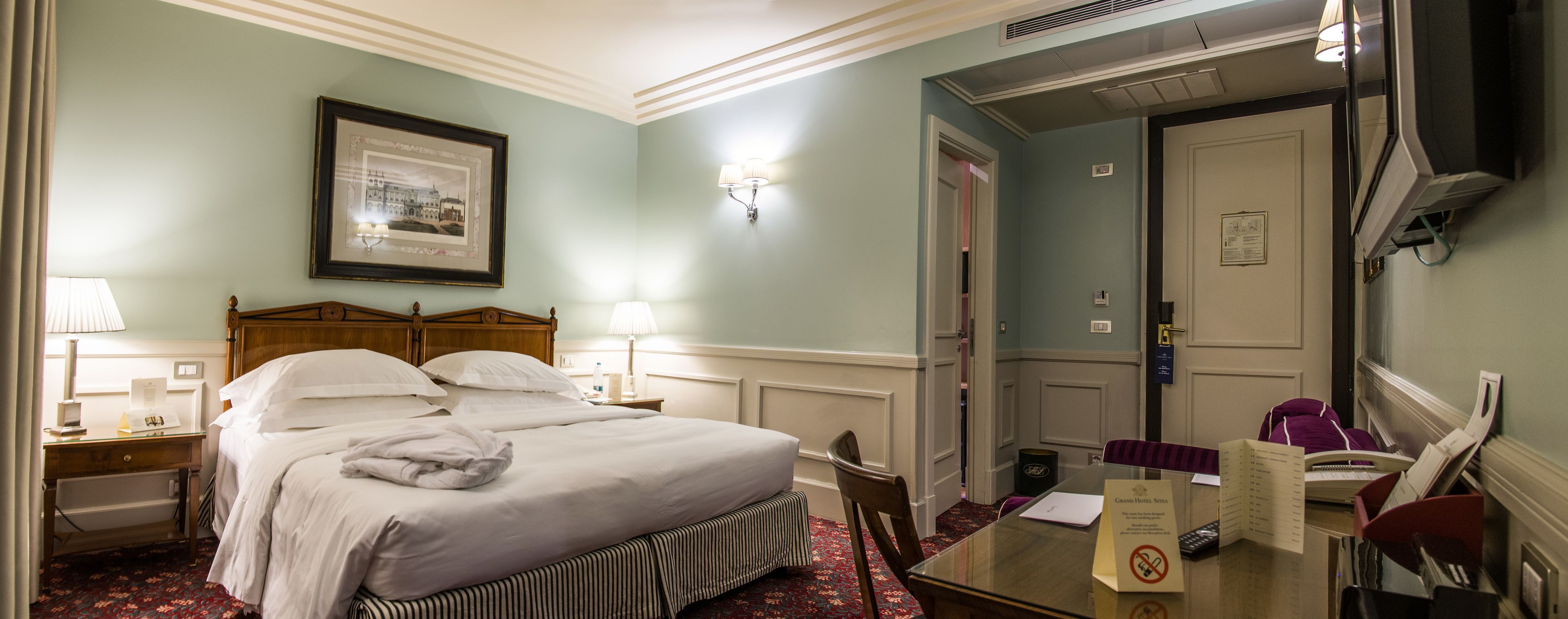 premium bedding, down duvets, minibar, in-room safe