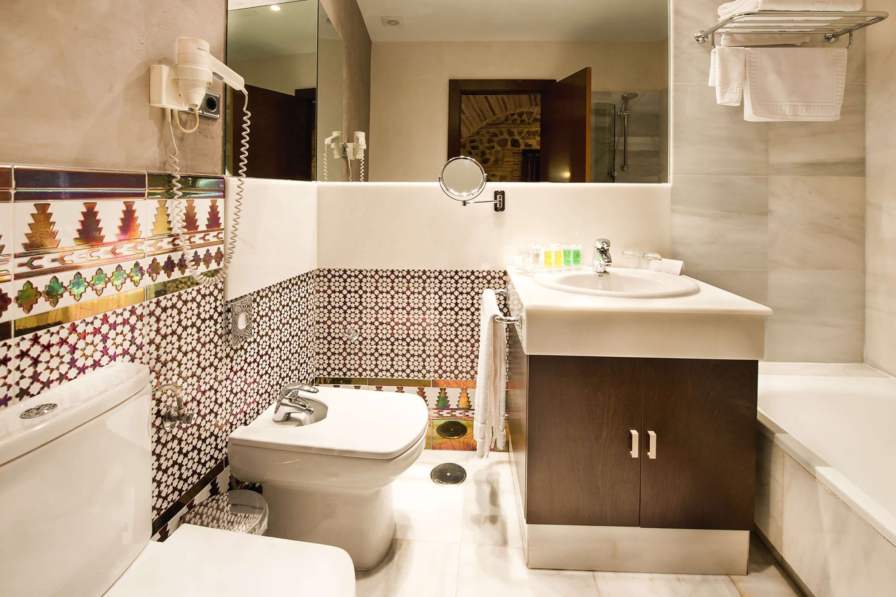 eco-friendly toiletries, hair dryer, slippers, bidet