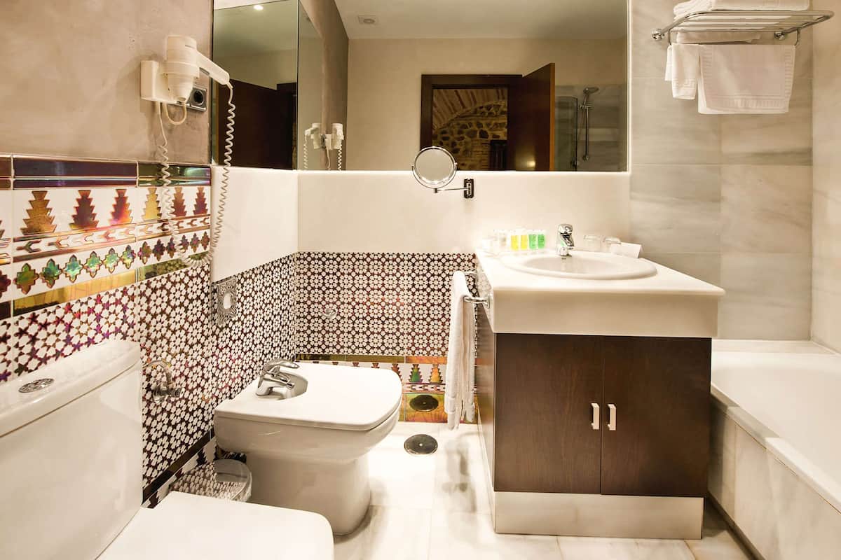 eco-friendly toiletries, hair dryer, slippers, bidet