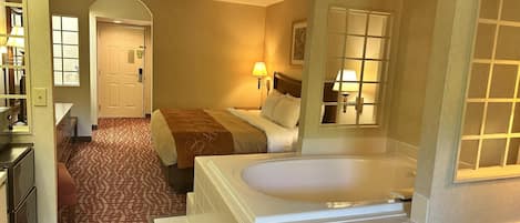 Suite, 1 King Bed, Jetted Tub, River View | Iron/ironing board, free WiFi, bed sheets