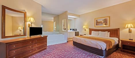 Suite, 1 cama King size, hidromasaje, vista al río | Tabla de planchar con plancha, wifi gratis y ropa de cama