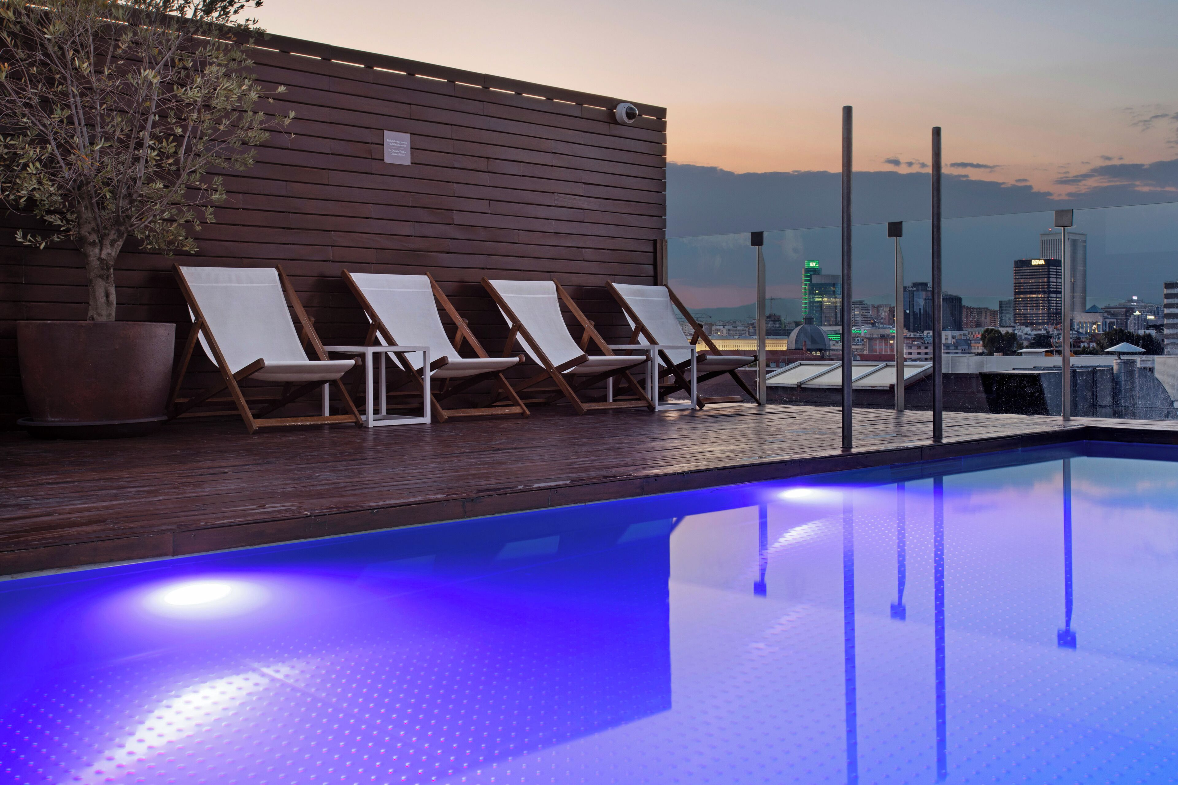 seasonal outdoor pool, open noon to 7:00 pm, pool umbrellas