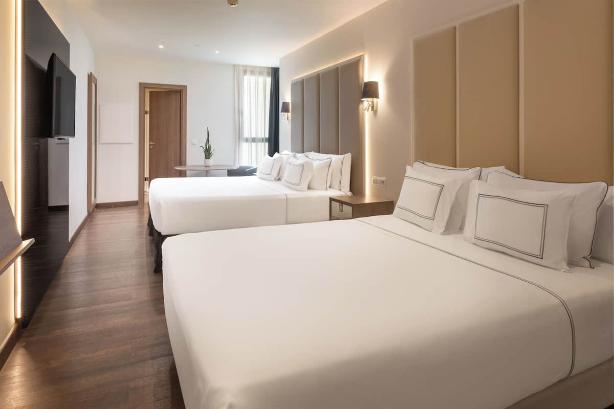 Egyptian cotton sheets, premium bedding, minibar, in-room safe