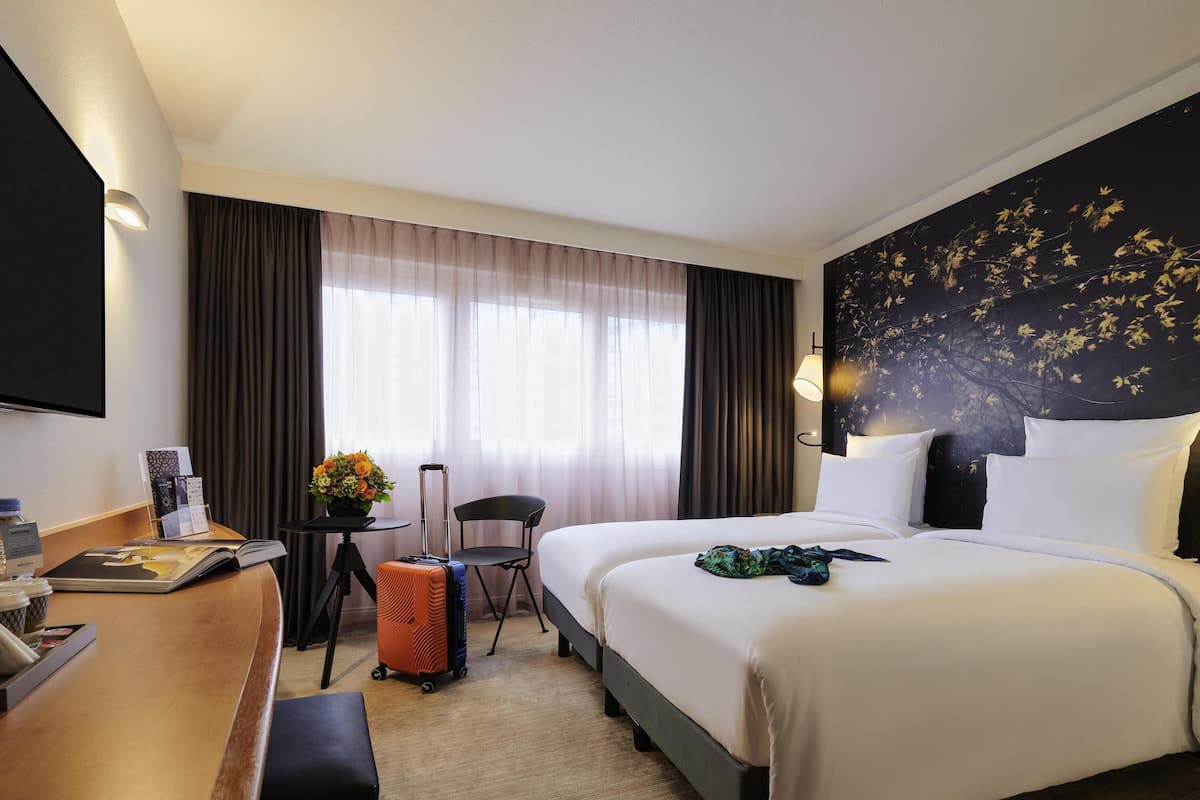 Roba de llit d'alta qualitat, caixa forta a l'habitació i escriptori