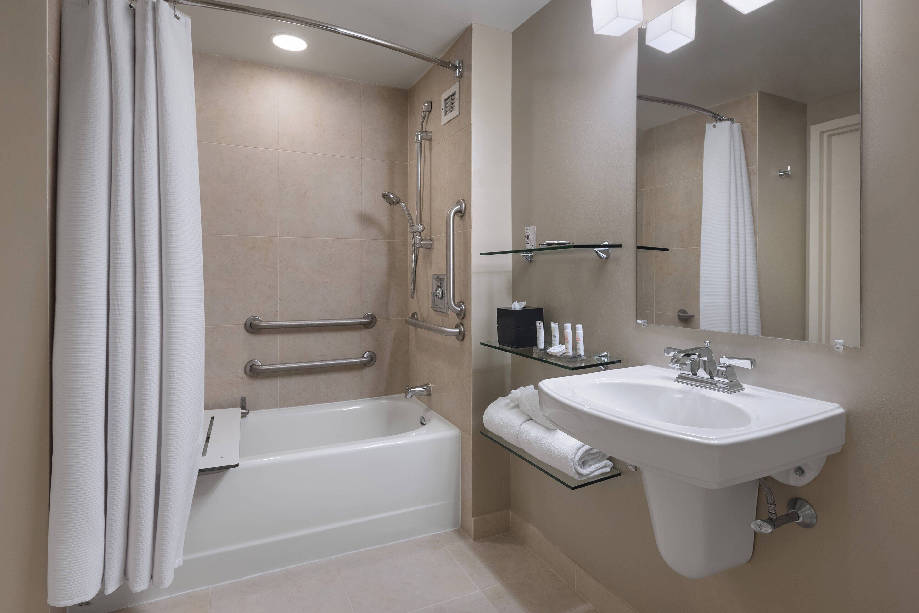 combined shower/bathtub, free toiletries, hair dryer, towels
