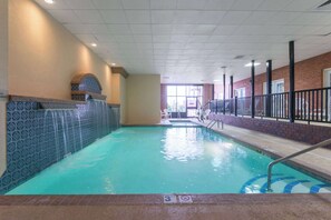 Indoor pool, open 9:00 AM to 9:00 PM, pool loungers