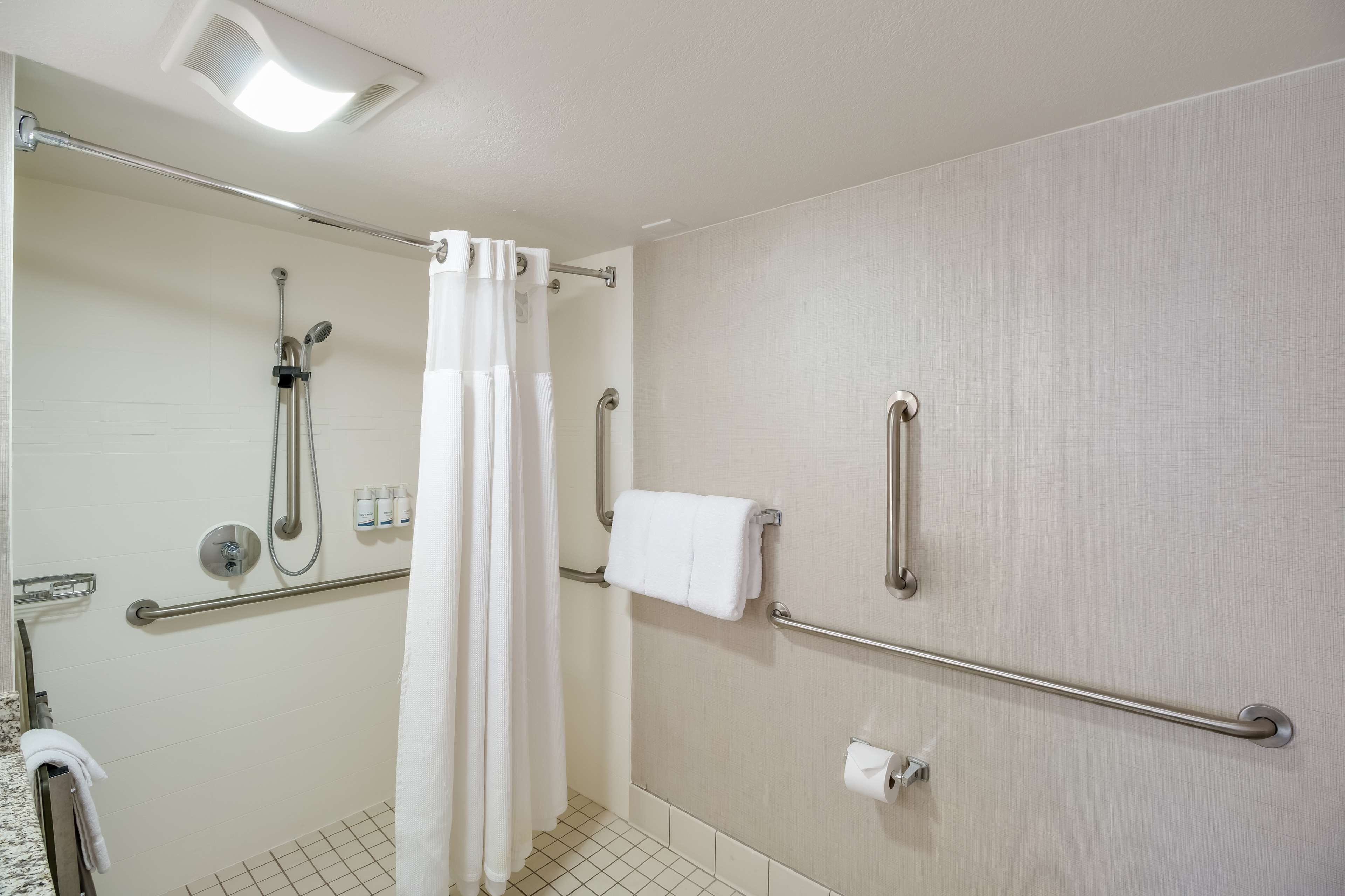suite, multiple beds, accessible (mobility roll in shower two bedrooms) | bathroom | combined shower/bathtub, free toiletries, hair dryer, towels