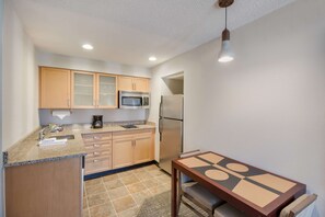 Suite, 1 King Bed with Sofa bed (One Bedroom) | Private kitchenette