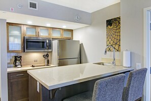 Full-sized fridge, microwave, stovetop, dishwasher