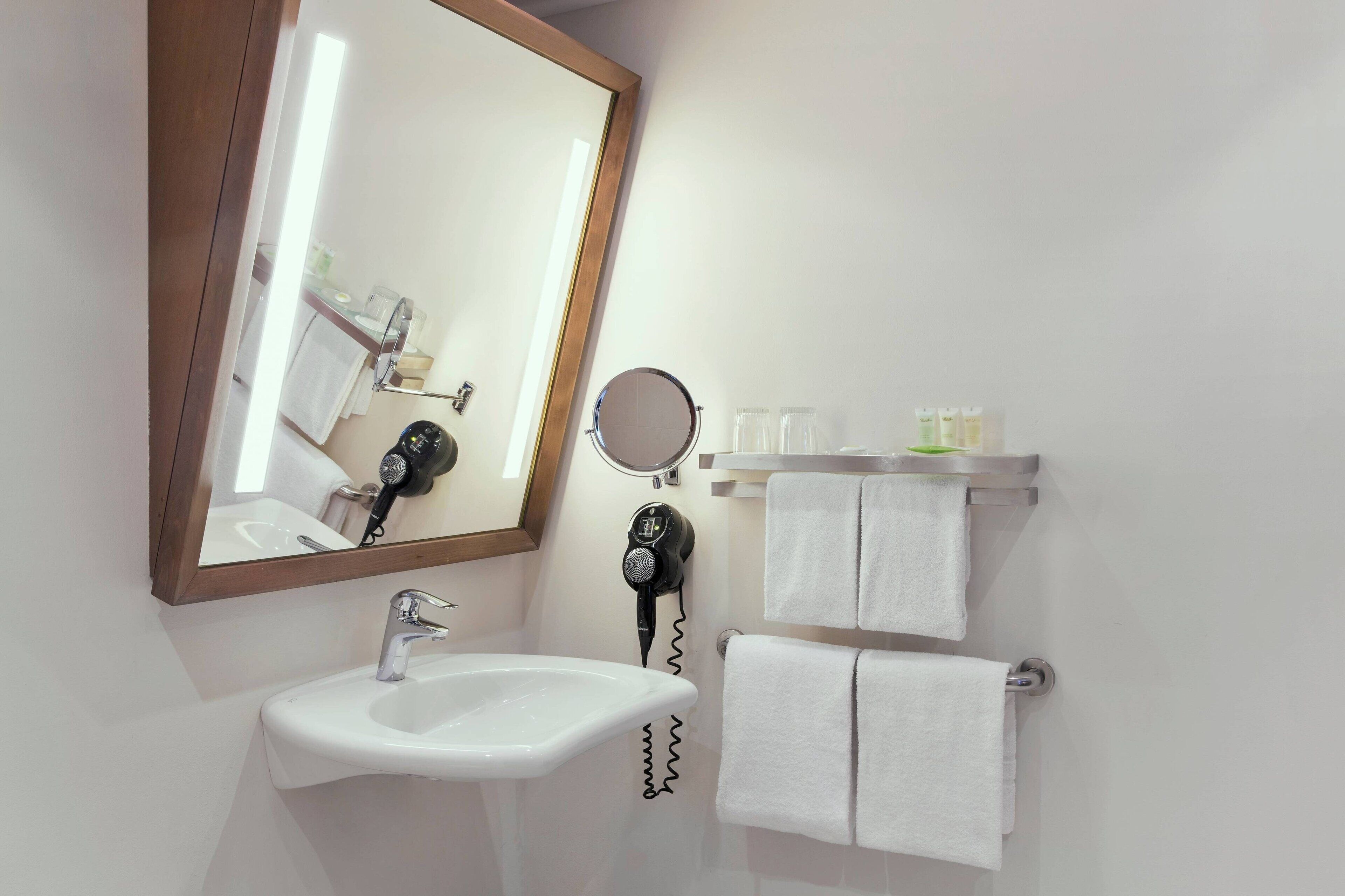 shower, free toiletries, hair dryer, towels