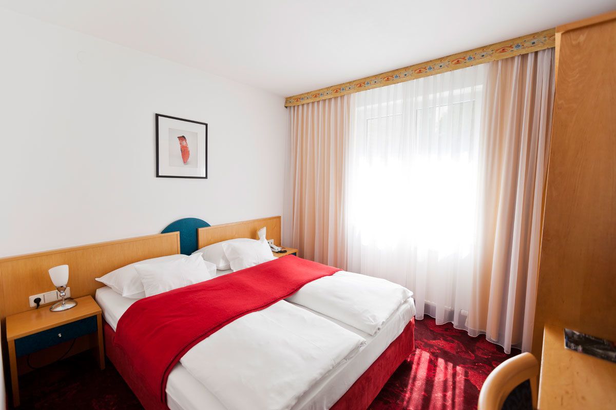 standard double room | in-room safe, desk, laptop workspace, blackout curtains