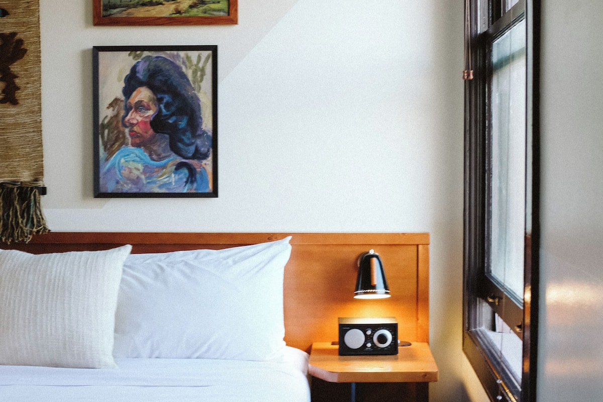 Premium bedding, blackout drapes, soundproofing, WiFi (free)