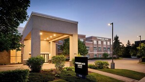 A modern hotel entrance with a sign for TownePlace Suites by Marriott. - TownePlace Suites by Marriott Mississauga-Arpt Corp Ctr (Mississauga)