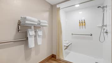 Habitación estándar, 1 cama King size, con acceso para personas discapacitadas, para no fumadores | Baño | Tina con regadera, amenidades de baño gratuitas, secadora de cabello