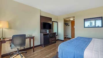 Desk, laptop workspace, blackout drapes, iron/ironing board
