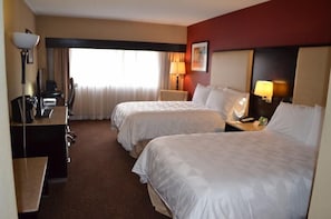Pillowtop beds, desk, blackout drapes, iron/ironing board