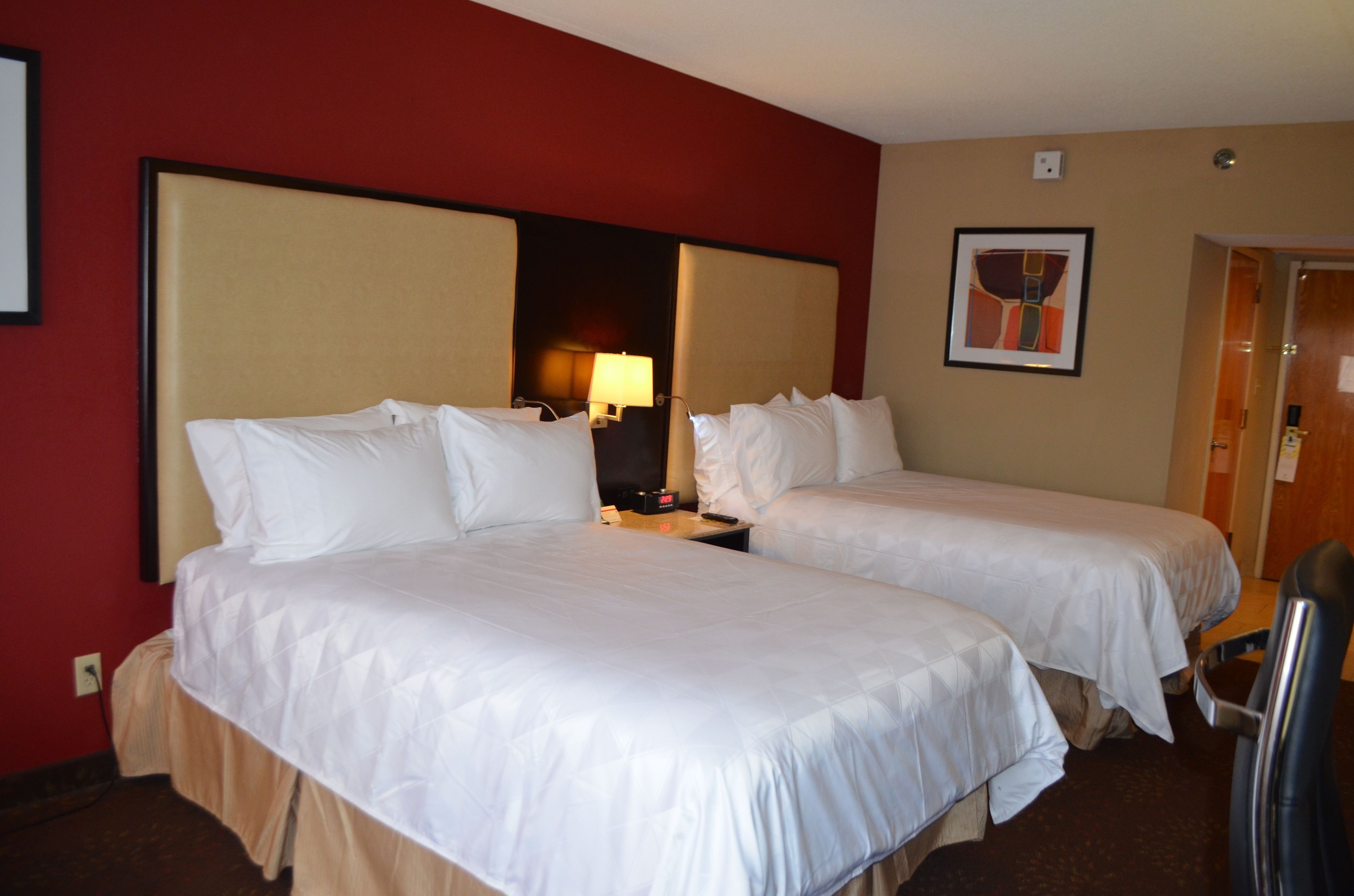 Pillow-top beds, desk, blackout curtains, iron/ironing board