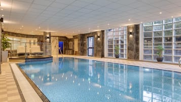 Indoor pool, open 6:30 AM to 8:00 PM, pool loungers