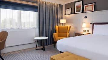 Deluxe Room, 1 King Bed | In-room safe, desk, laptop workspace, iron/ironing board