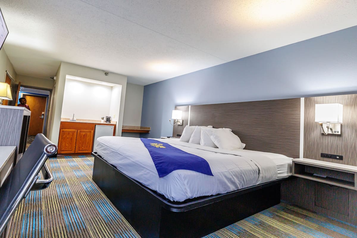 Premium bedding, desk, blackout drapes, iron/ironing board