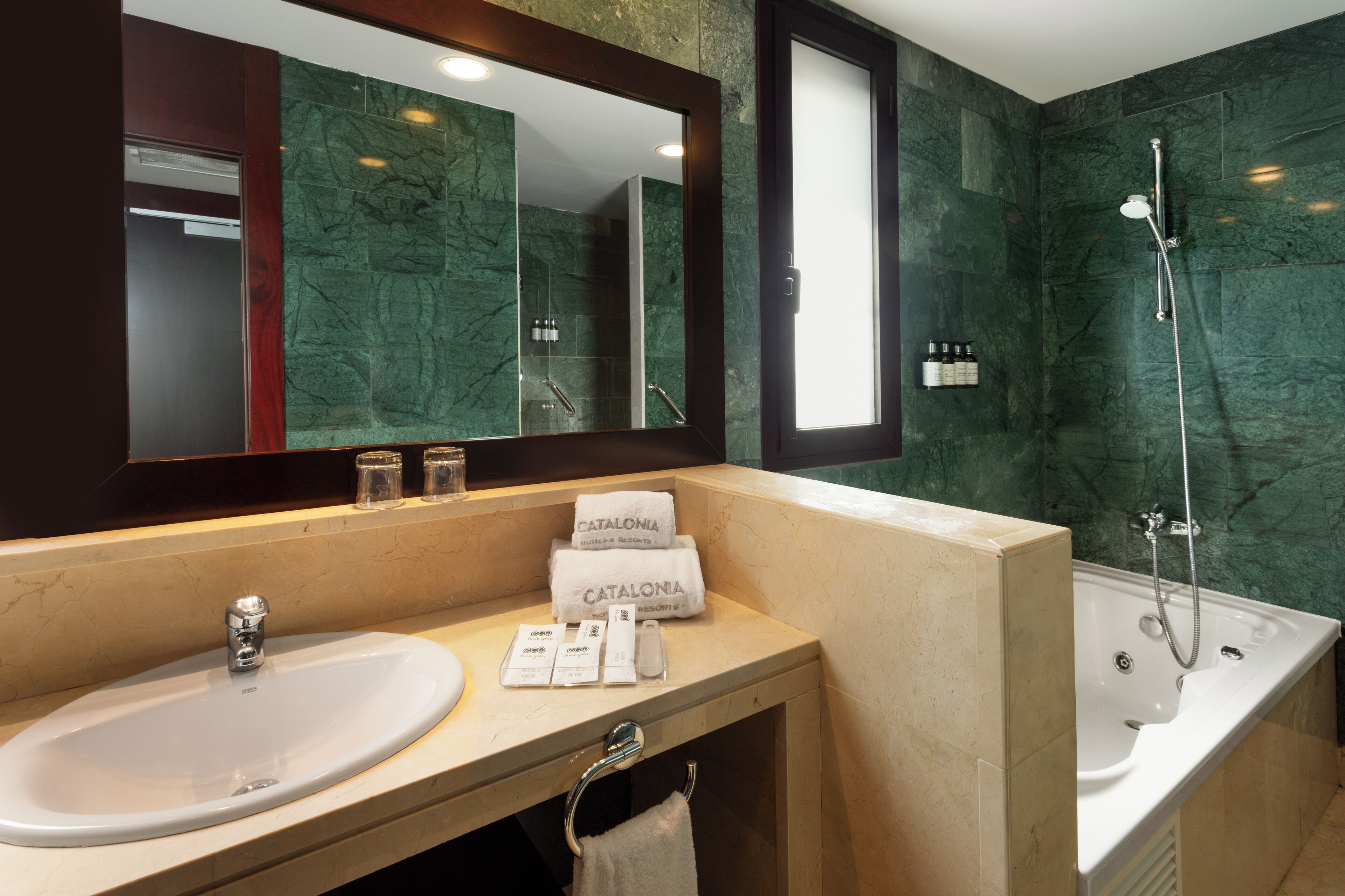 eco-friendly toiletries, hair dryer, bidet, towels