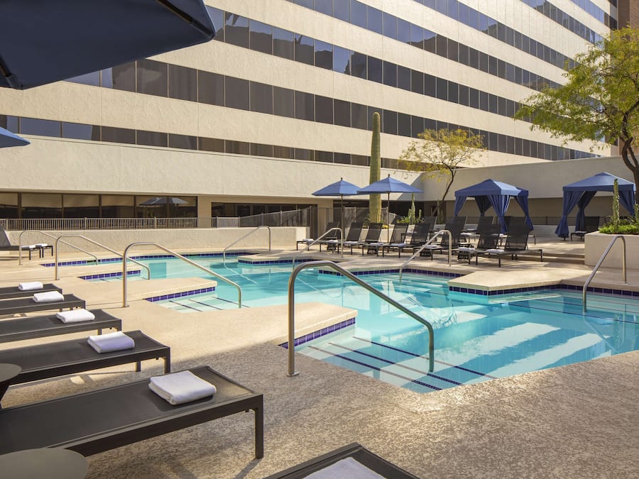 Outdoor pool, free pool cabanas, pool umbrellas