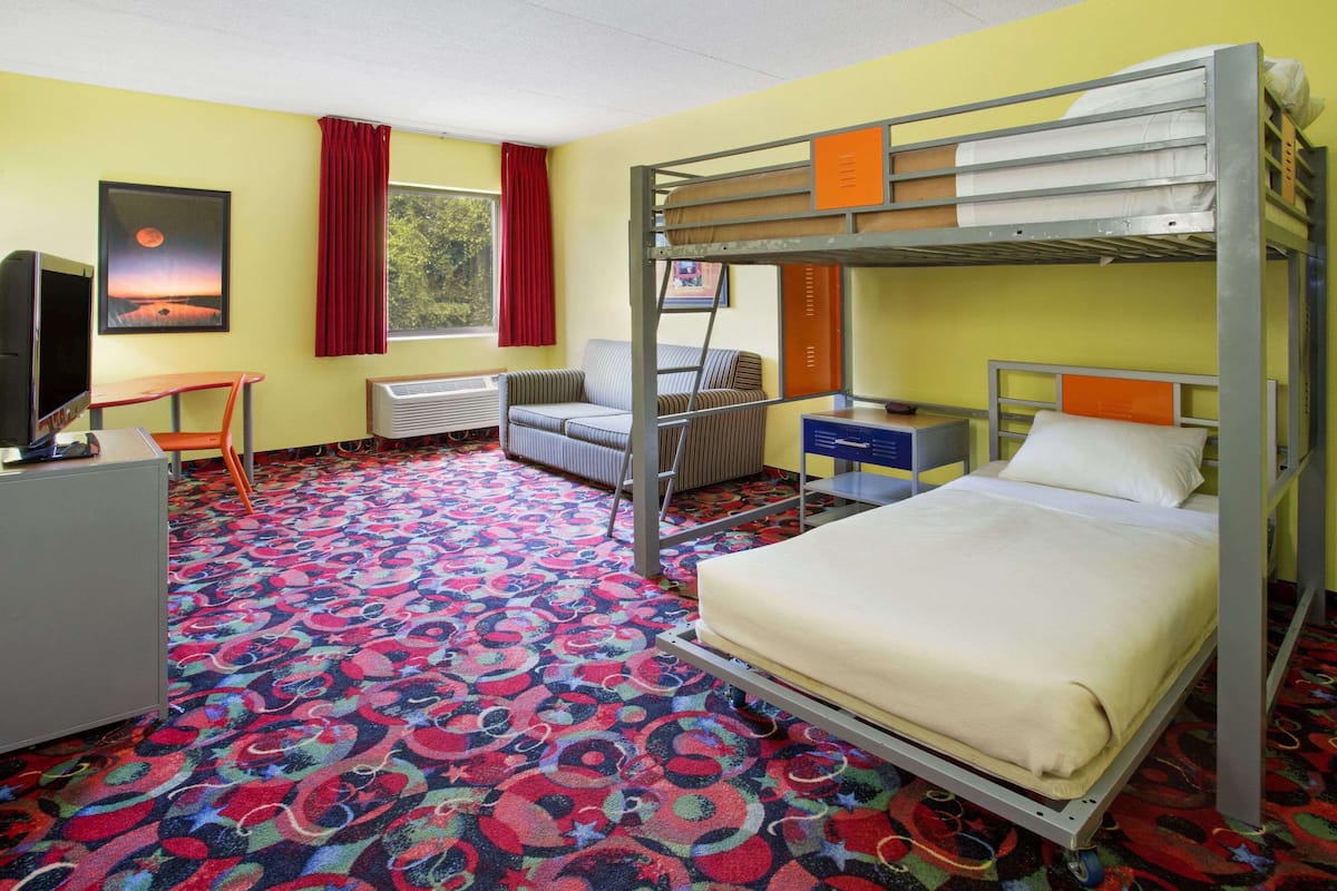 Suite, Multiple Beds, Non Smoking | Individually decorated, individually furnished, desk, iron/ironing board