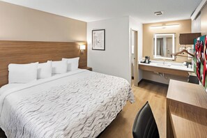 Standard Room, 1 King Bed (Smoke Free) | Pillowtop beds, in-room safe, desk, laptop workspace