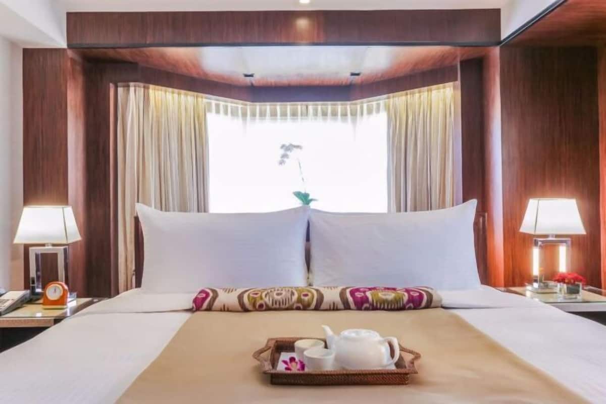 Ropa de cama de alta calidad y minibar