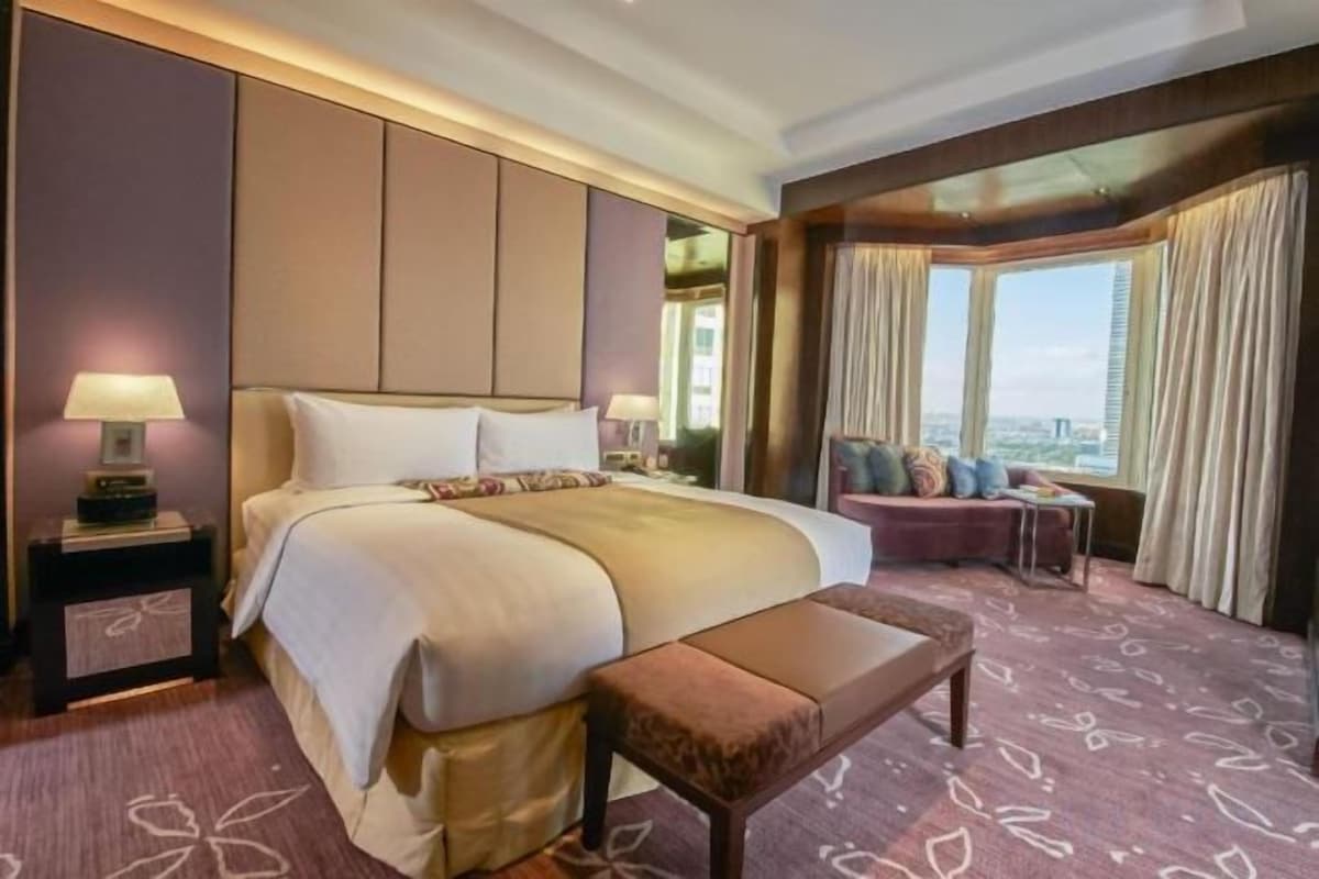 Luxe beddengoed, een minibar, een kluis op de kamer, een laptopwerkplek
