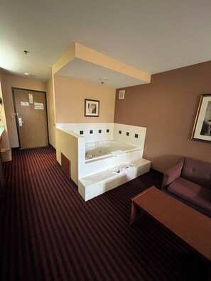 Room, 1 King Bed, Non Smoking, Jetted Tub | Iron/ironing board, free WiFi, bed sheets