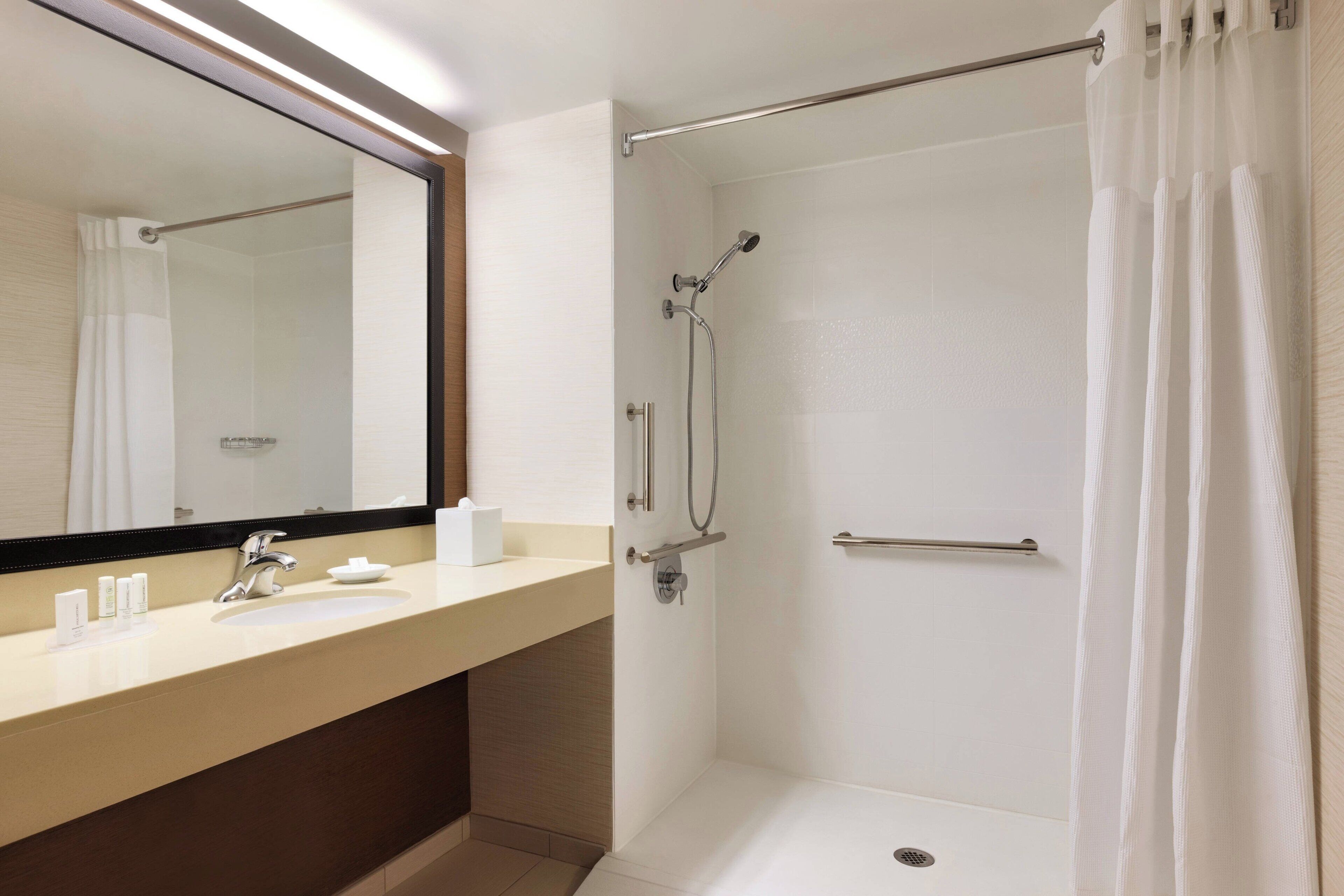 combined shower/bathtub, free toiletries, hair dryer, towels