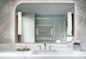 Designer toiletries, hair dryer, towels, soap