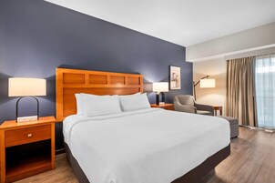 Deluxe Suite, 1 King Bed with Sofa bed, Non Smoking, Pool View | Premium bedding, pillowtop beds, desk, laptop workspace