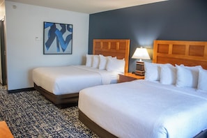 Premium bedding, pillowtop beds, desk, laptop workspace