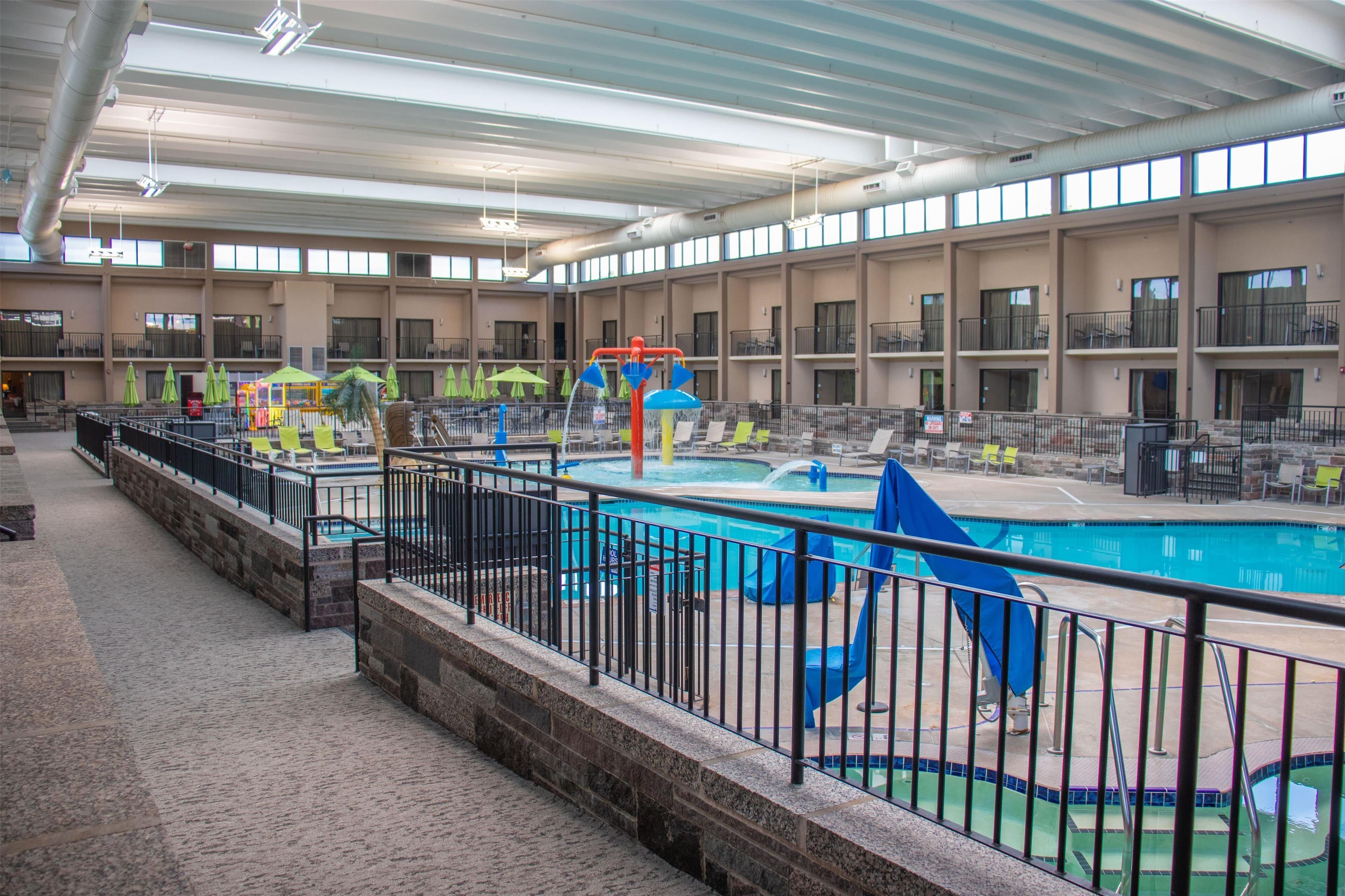 2 indoor pools, open 8:00 AM to 10:00 PM, pool umbrellas
