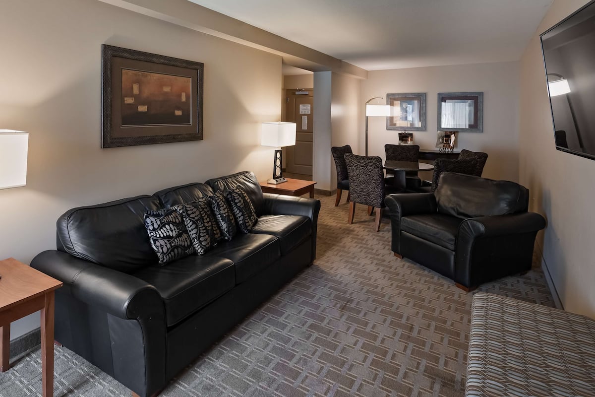 Premium bedding, pillow-top beds, desk, laptop workspace