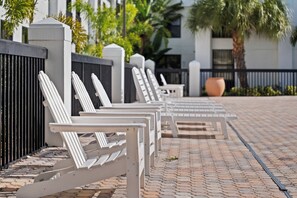 Outdoor pool, open 9 AM to 10 PM, pool loungers