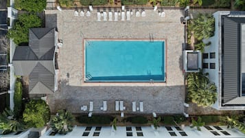 Outdoor pool, open 9 AM to 10 PM, pool loungers